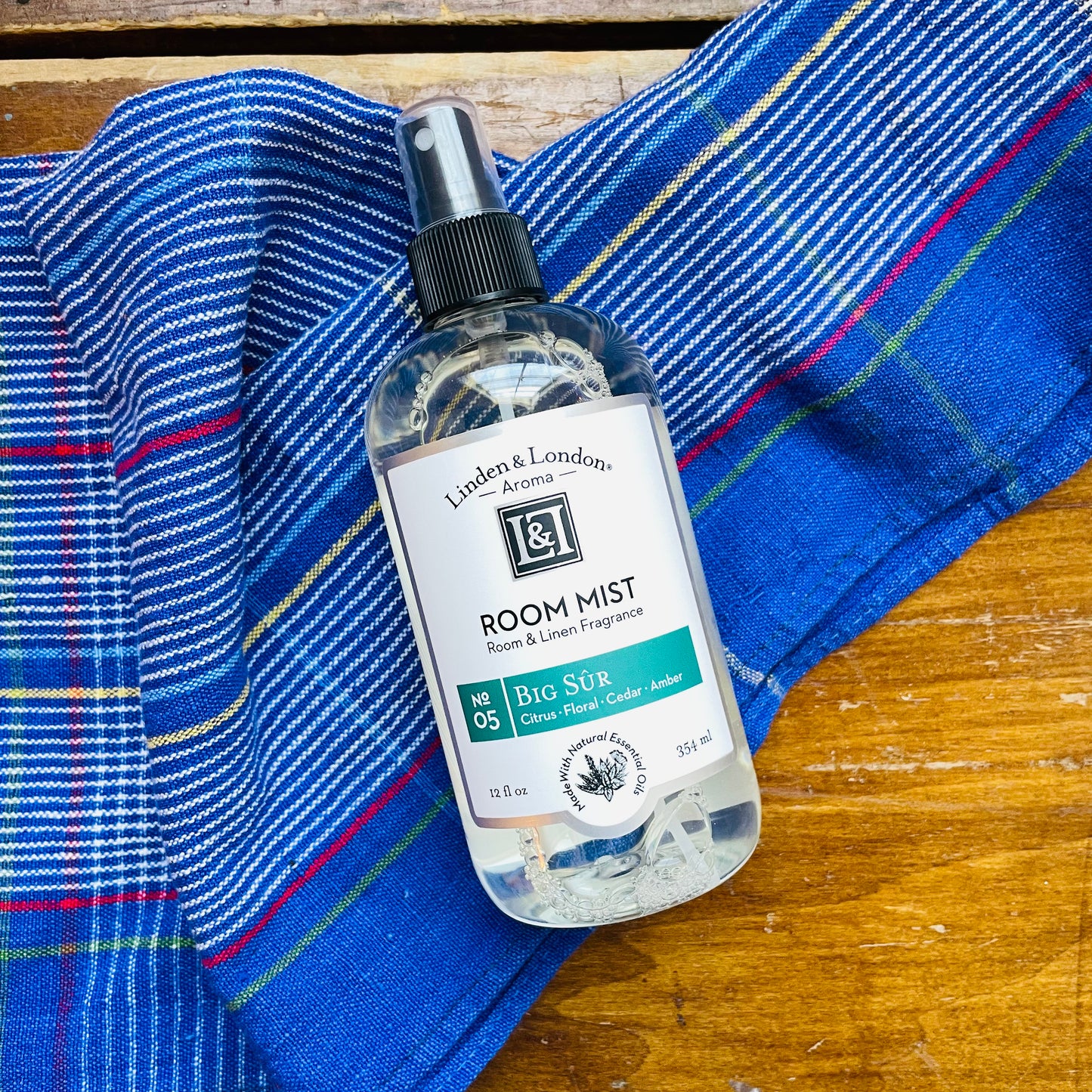 big sur room mist linen spray that smells of citrus, floral, cedar and amber