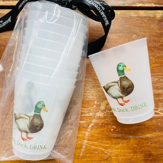 A set of frosted white plastic cups with a mallard drake illustration and the text 'Duck, Duck, DRINK'.
