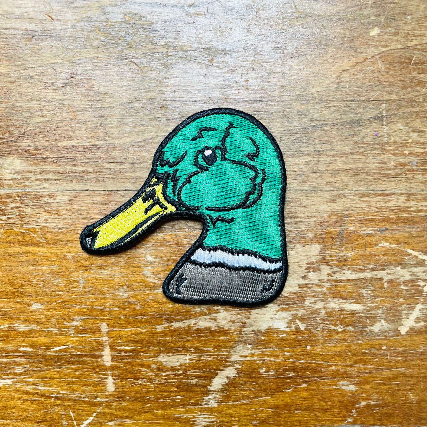 Embroidered patch of a duck 